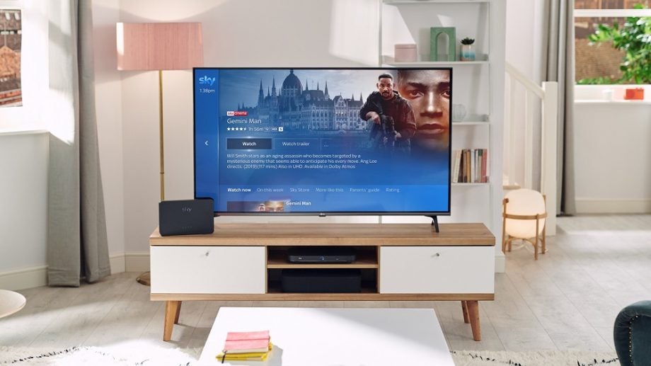 A TV standing on a shelf with Sky Q box beside, Gemini Man being displayed on Sky Cinema