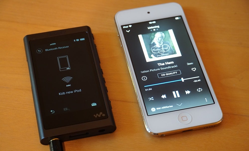 A black Sony NW A55 audio player playing audio via bluetooth being sent from an iPhone