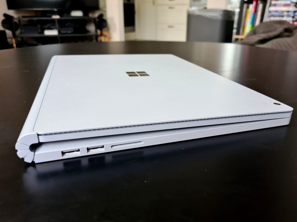 Close up image of a white Surface Book 3's ports section on left