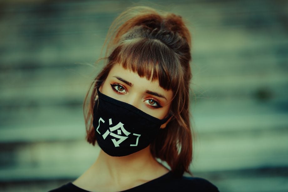 Picture of girl wearing a black face mask