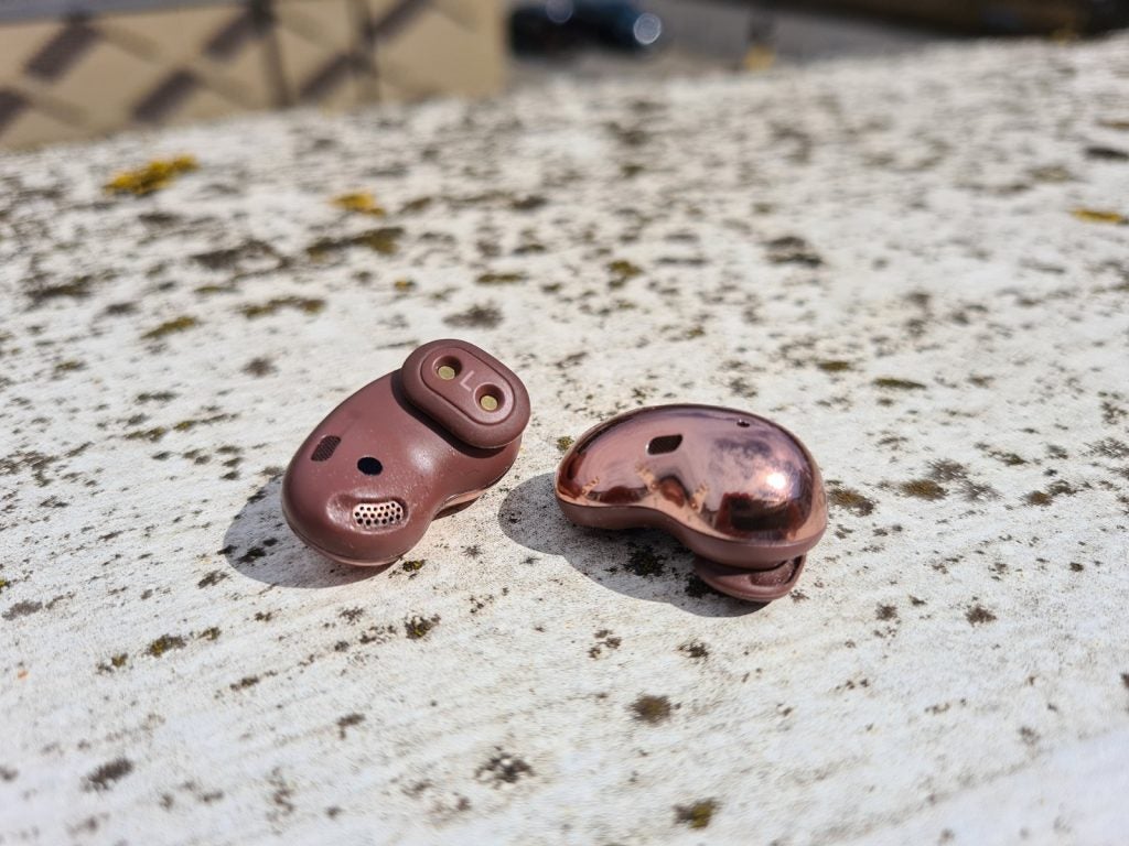 Samsung Galaxy Buds LiveBrown Galaxy Buds Live earbuds kept on a concrete floor