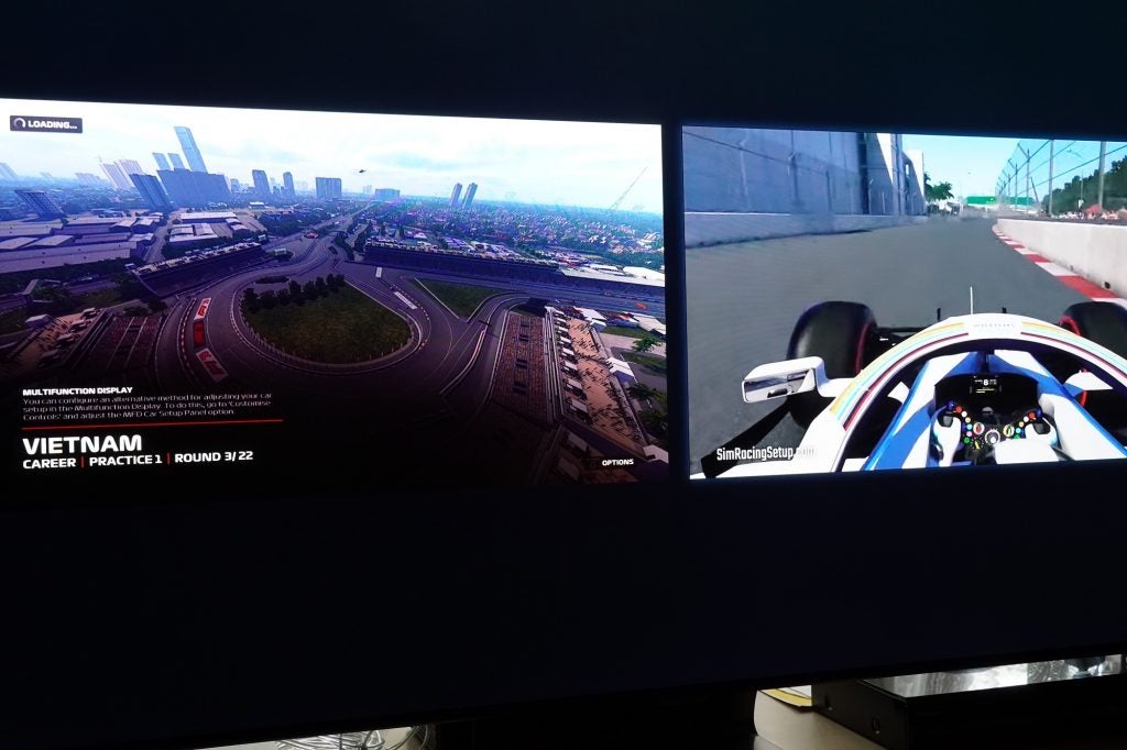 Multi-View on the Samsung Q95TA black Samsung Q95T TV displaying two different videos in Multiview screen mode
