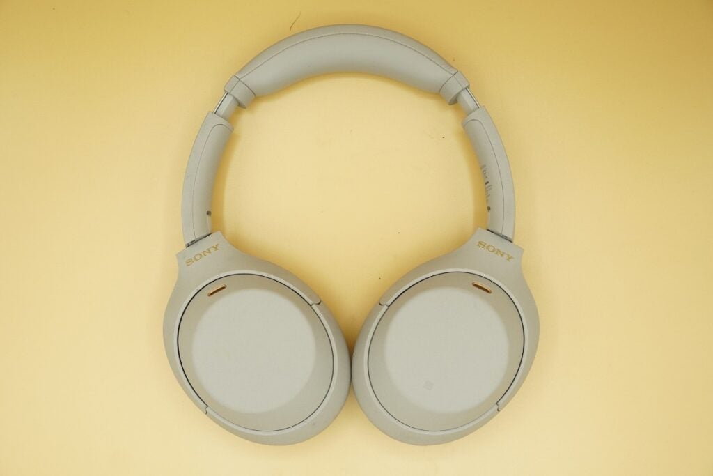 Sony WH-1000XM4 flat surfaceView from top of white Sony WH1000 XM4 headphones