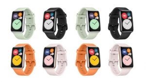 Eight different colored Huawei watches standing on a white background