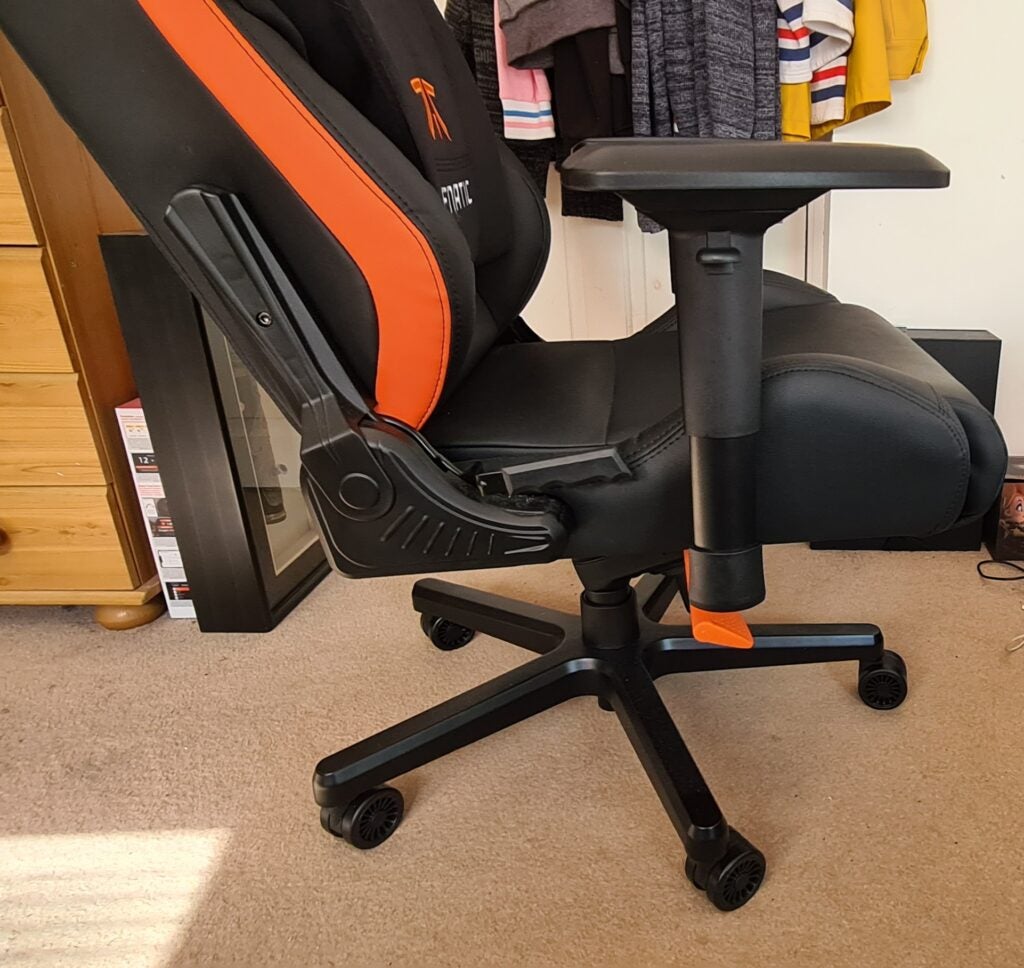 Right side view of a orange-black Anda seat gaming chair