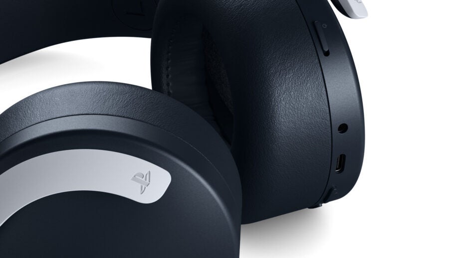 Close up image of black PS headphones earcups