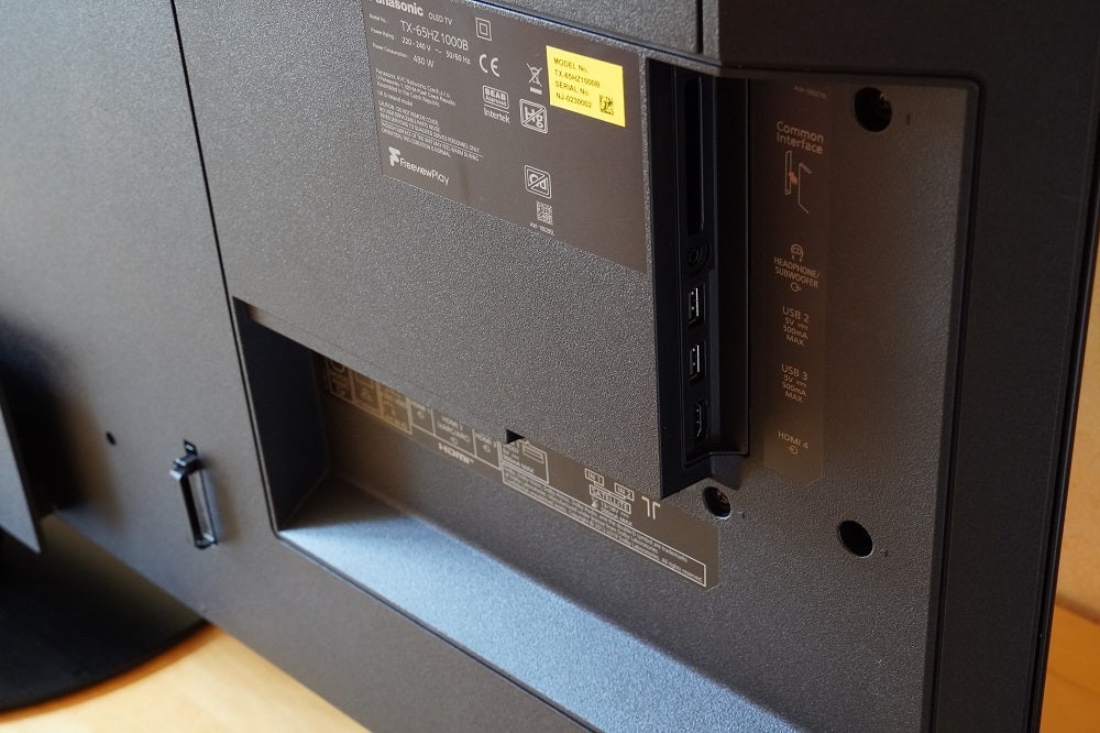 A black Panasonic HZ1000 TV's back panel's ports section view