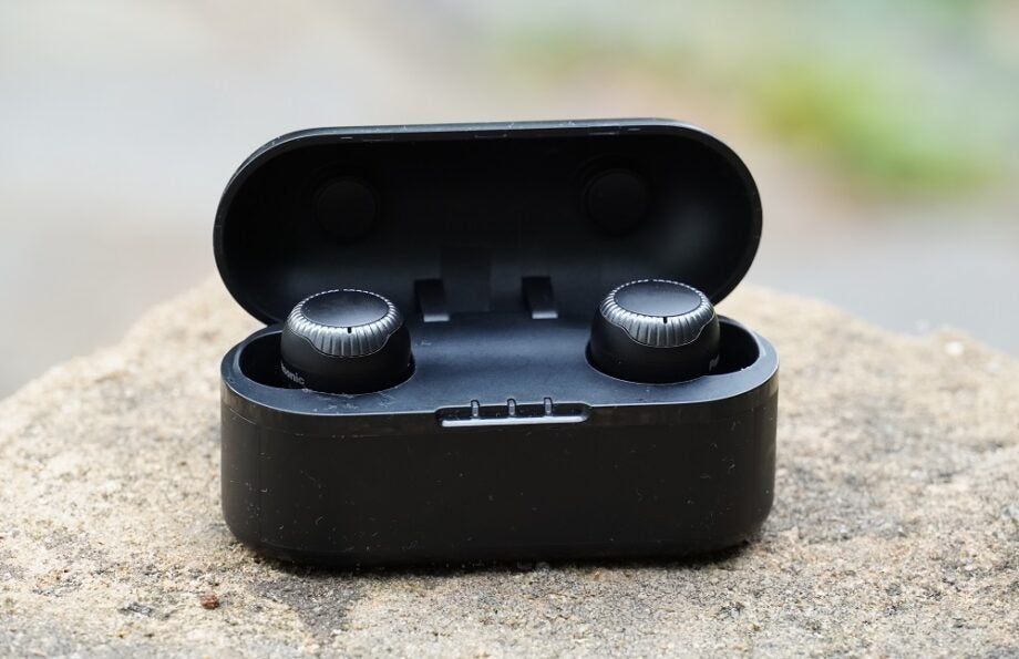 Black Panasonic RZ-S300W earbuds resting in it's black case