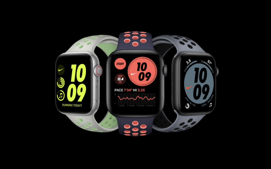 Three different colored Apple watches standing on a black background