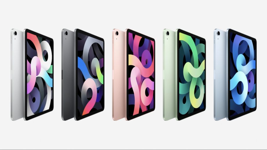 Five different colored iPad standing on a white background