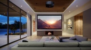 A black Sony projector attached to roof of a living room