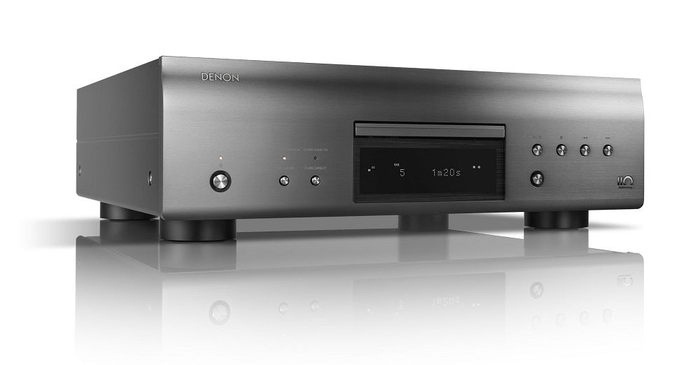 Left angled view of a silver-gray Denon DCD A110 standing on white background