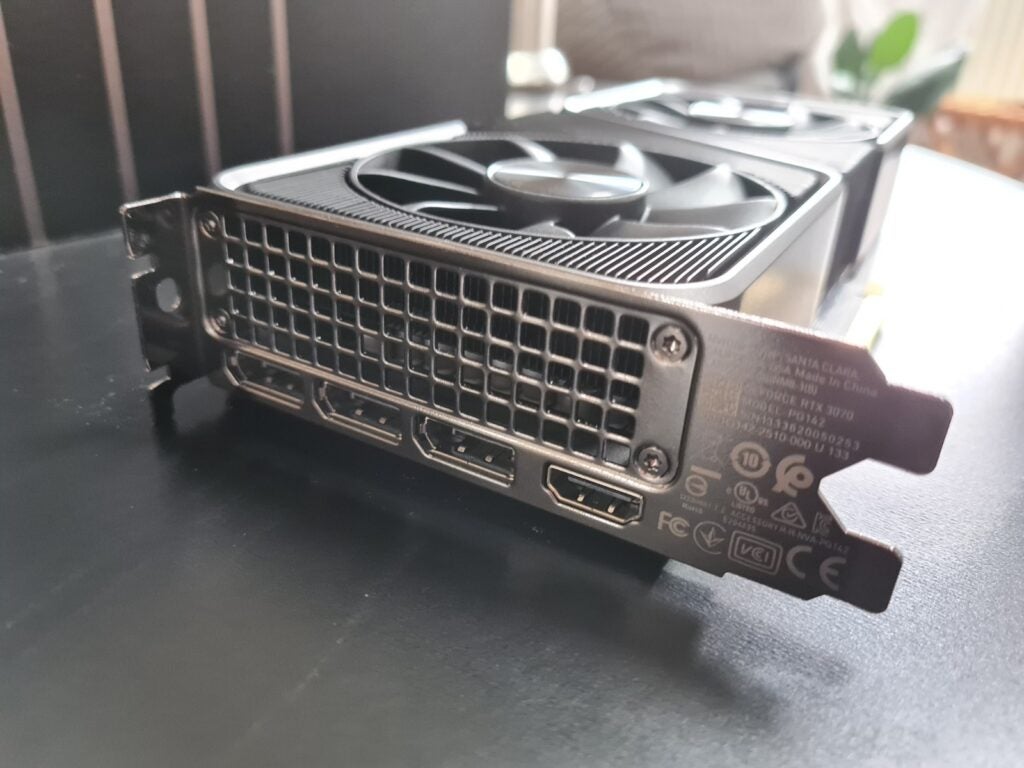 Nvidia RTX 3070Left angled view of a GeForce RTX 3070 resting on a wooden table