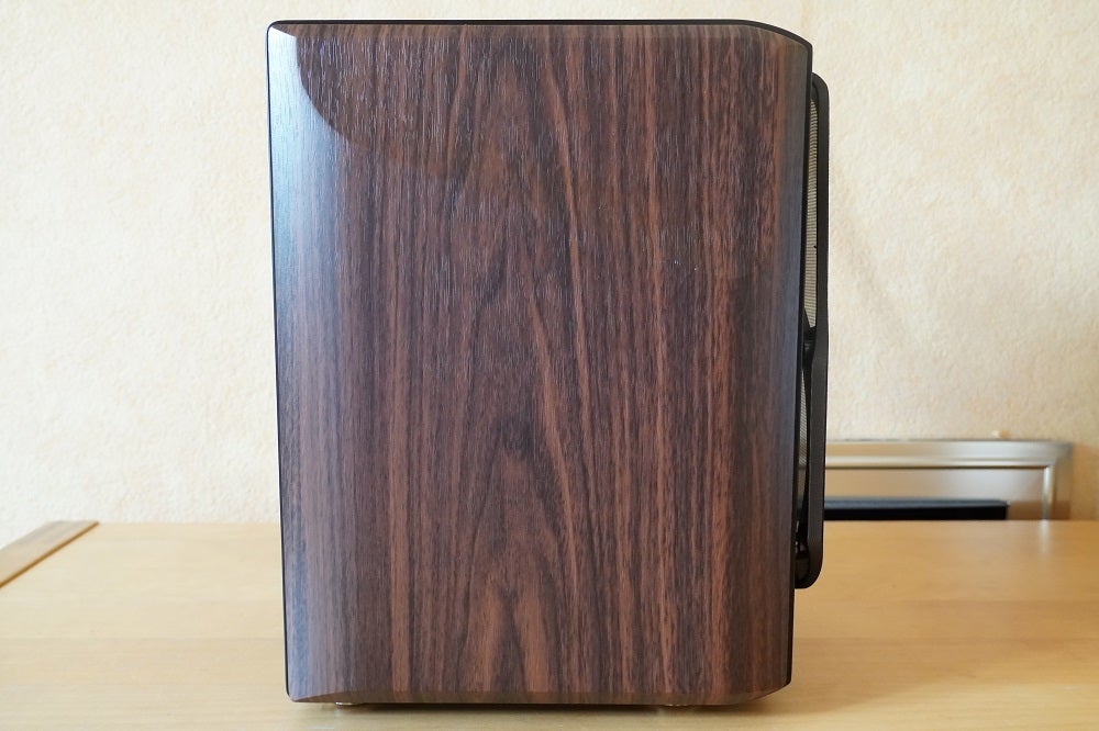 Wooden finish side view of a silver-black Edifier S2000 MKLL speaker