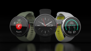 Three different colored Polar Vantage V2 watches standing on a black background
