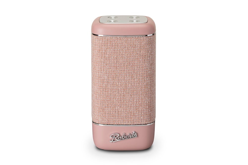 A pink Roberts Beacon 320 speaker standing on white background