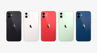 Five different colored iPhones standing beside one another on a white background