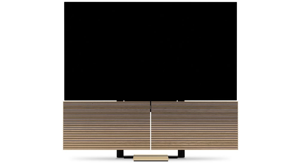 A cream-black BO Beovision Harmony OLED TV standing on white background