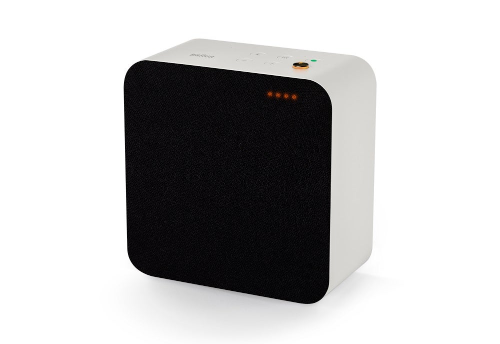 A black and white Braun LE03 speaker on a white background