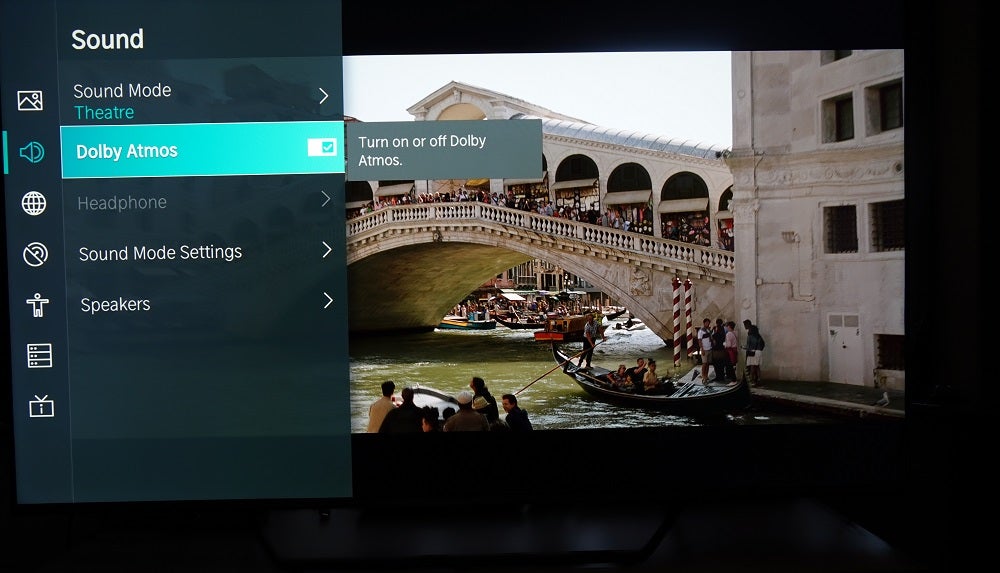 A black Hisense U7QF TV displaying Dolby Atmos setting under Sound settings menu
