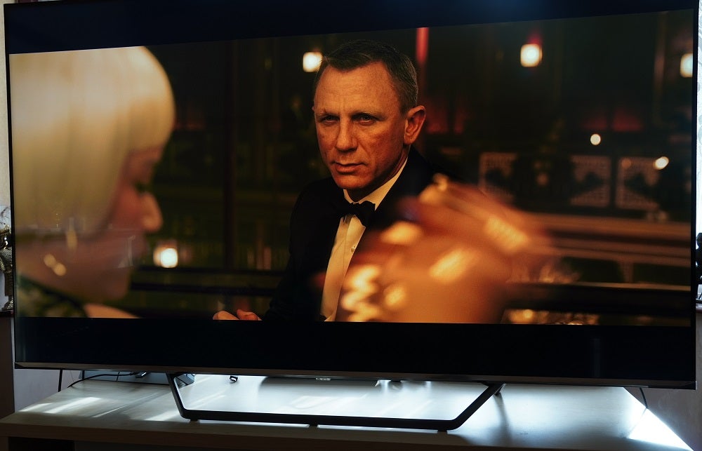 A black Hisense U7QF TV displaying a scene from Skyfall