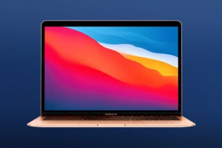 A Macbook Air standing on a blue background