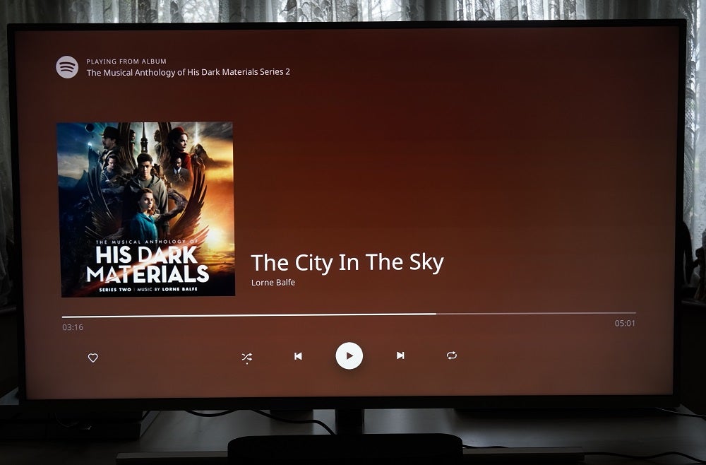 Music being played on a TV on Spotify via Roku Streambar