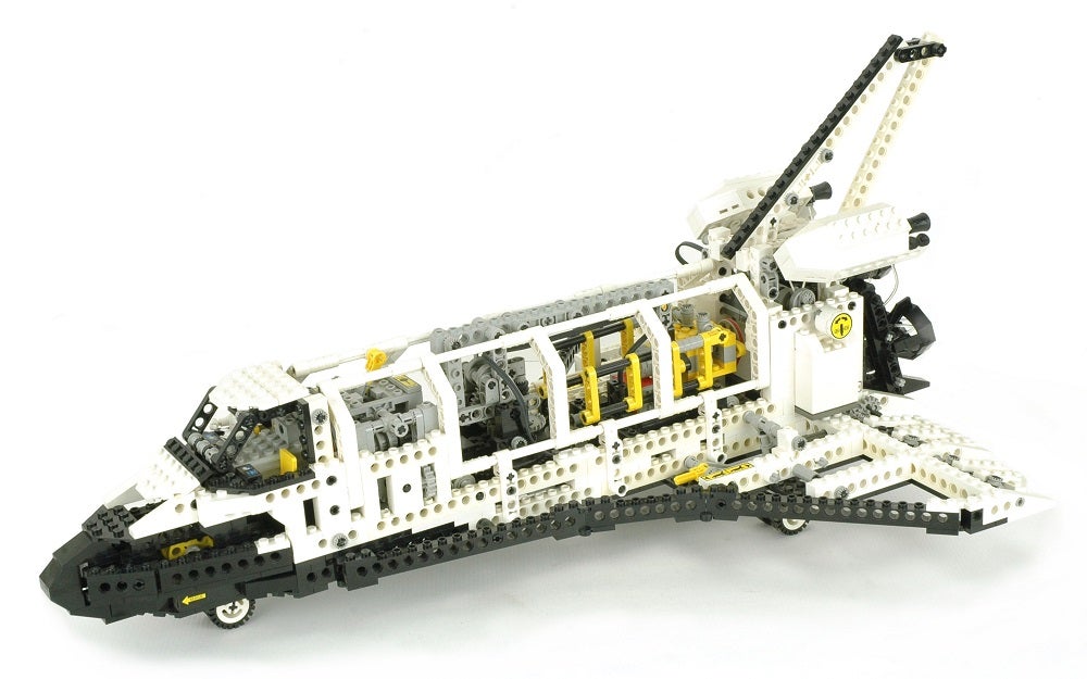 A space shuttle built from LEGOs standing on white background