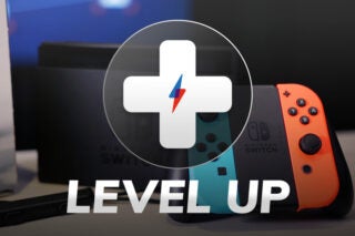 A Nintendo switch gaming console standing with a plus logo on top and Level up written below