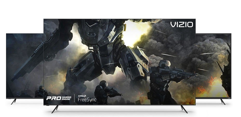 Three AMD freesync Vizio TVs standing on white background, displaying a big robot standing between a battle field