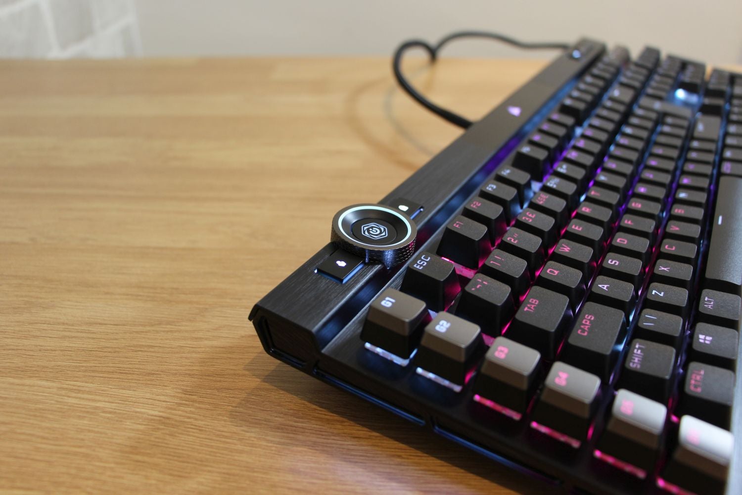The Corsair K100's wheel has eight default uses, including skipping music tracks and scrolling down webpages