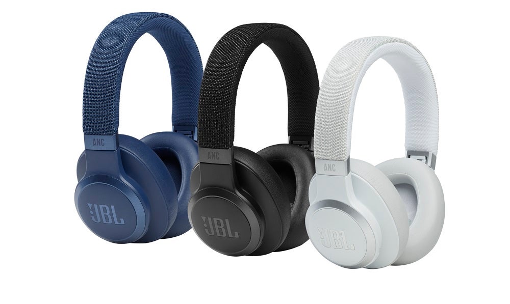 Blue, black and white colored JBL Live 660NC headphones standing on white background