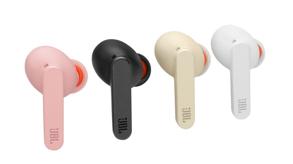 Pink, black, cream, and white JBL live pro earbuds standing on white background