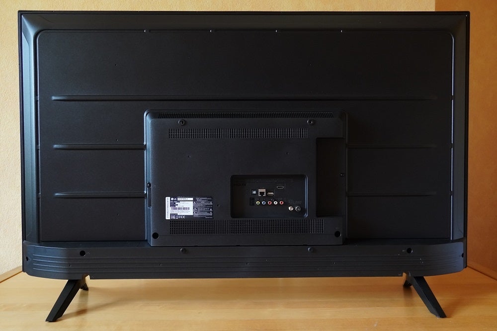 A black LG50UN70006LA TV's back panel view