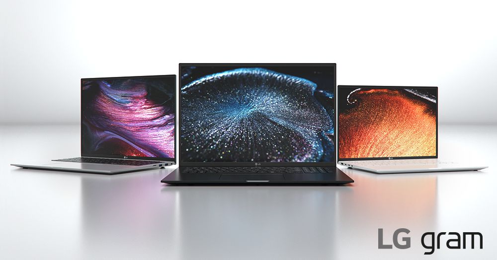 Three different colored LG Gram laptops standing on white background