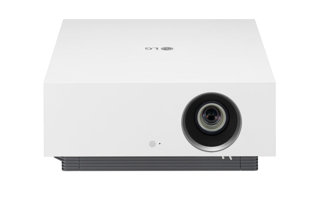 A white LG Cinebeam 4K projector standing on a white backgroundA white LG Cinebeam 4K projector attached to roof, displaying a picture of mountains via Airplay