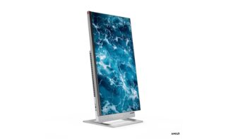 A black and silver Lenovo Yoga AIO 7 all in one desktop standing on white background