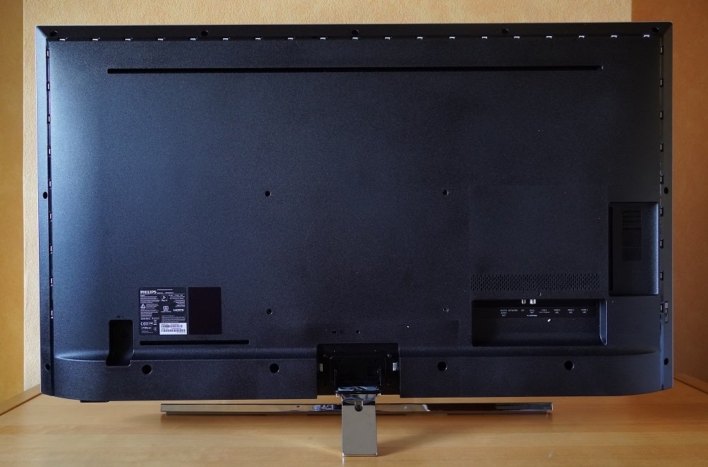A black Philips 50PUS8545 TV's back panel