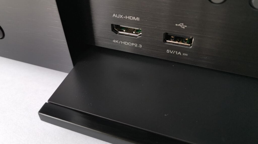 fascia cover of the Denon AVC-X4700Hlower back viiew of Denon amplifier system showing Aux-HDMI and USB connections