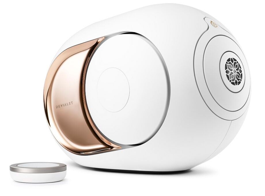 White and brown Devialet Phantom wireless speaker on white background