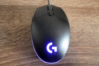 A black G03 lightsync mouse with blue light in it's logo at top back