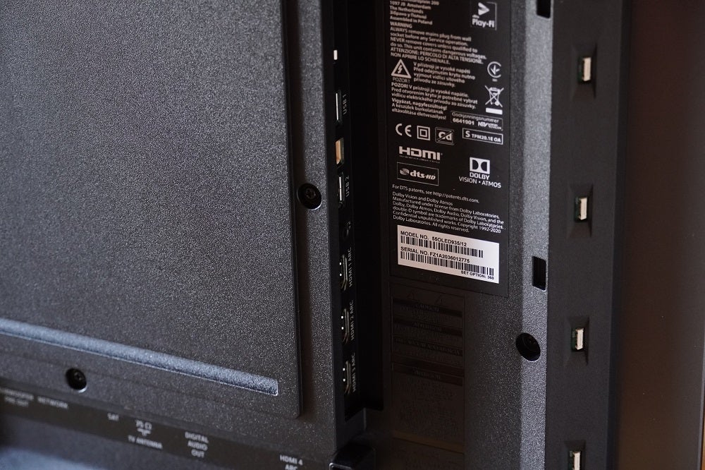 Close up image of a black Philips OLED935's back panel's ports section