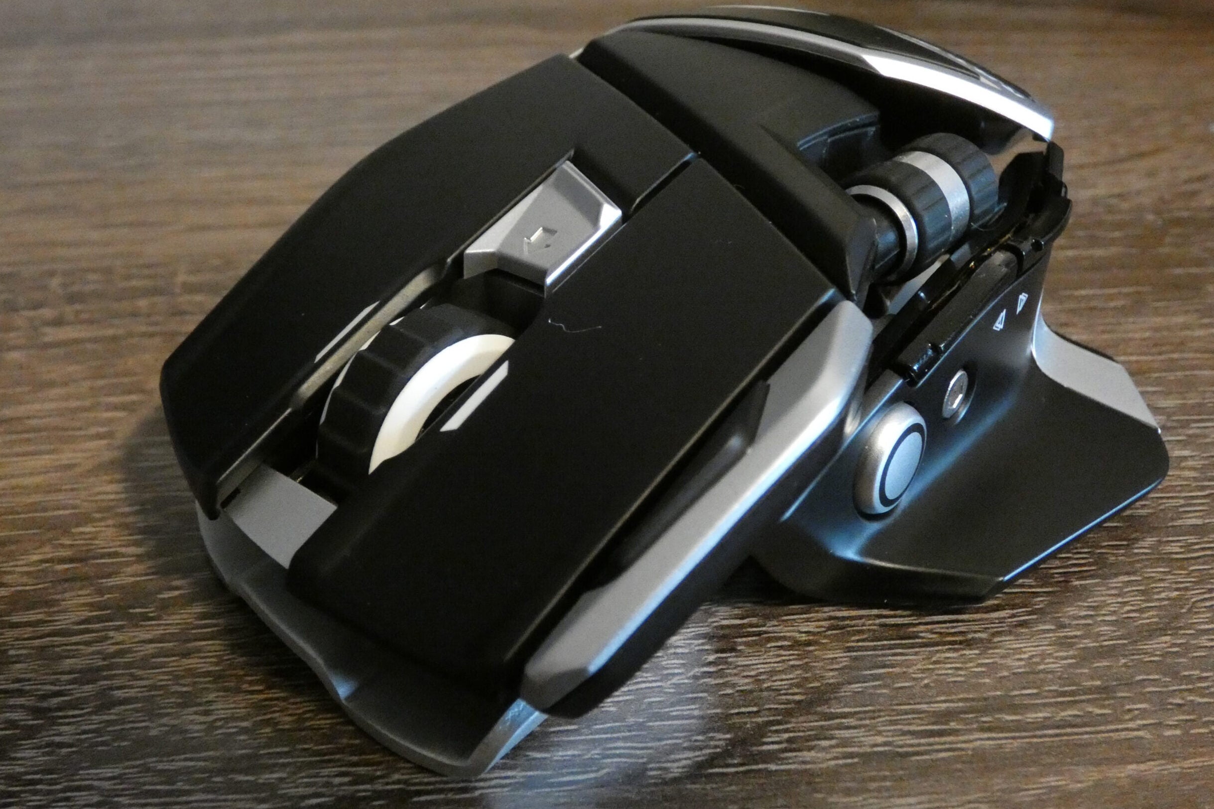 front, top and side view of gaming mouse in clear sight on table