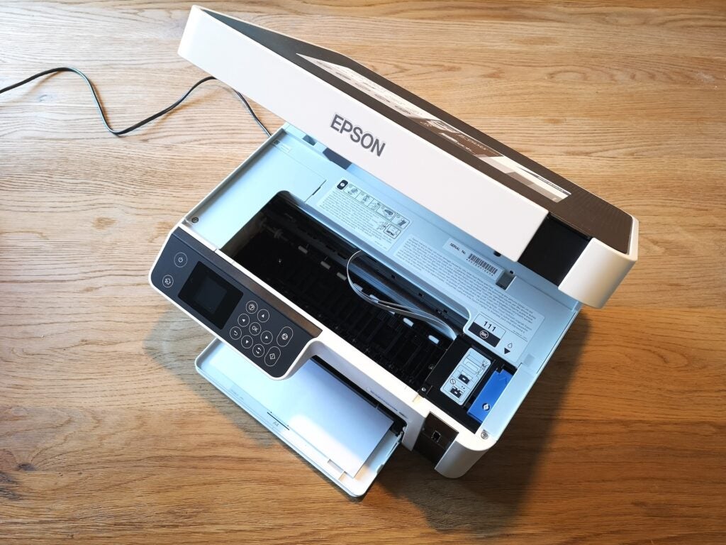 White Epson printer open in upper view