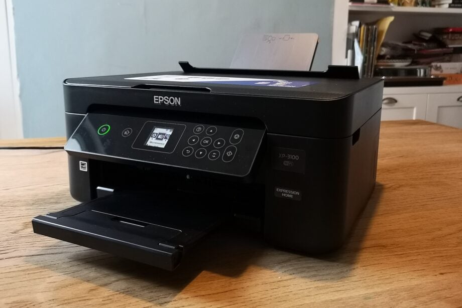 Front view of the Epson printer showing paper exit and control panel