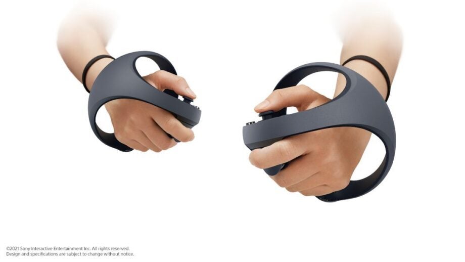 Black PSVR-2 controllers held in hand on white background
