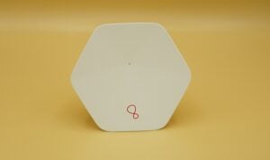 A white Virgin Intelligent WiFi Pod standing on a table