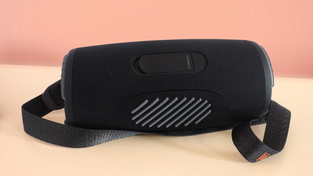 Black wireless jbl sound speaker that looks convenient to carry with a comfort strip