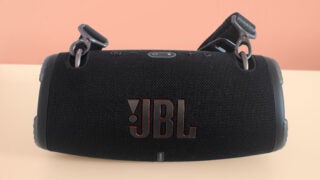 “JBL” logo view of the JBL black wireless sound speaker no doubt is permanent and original