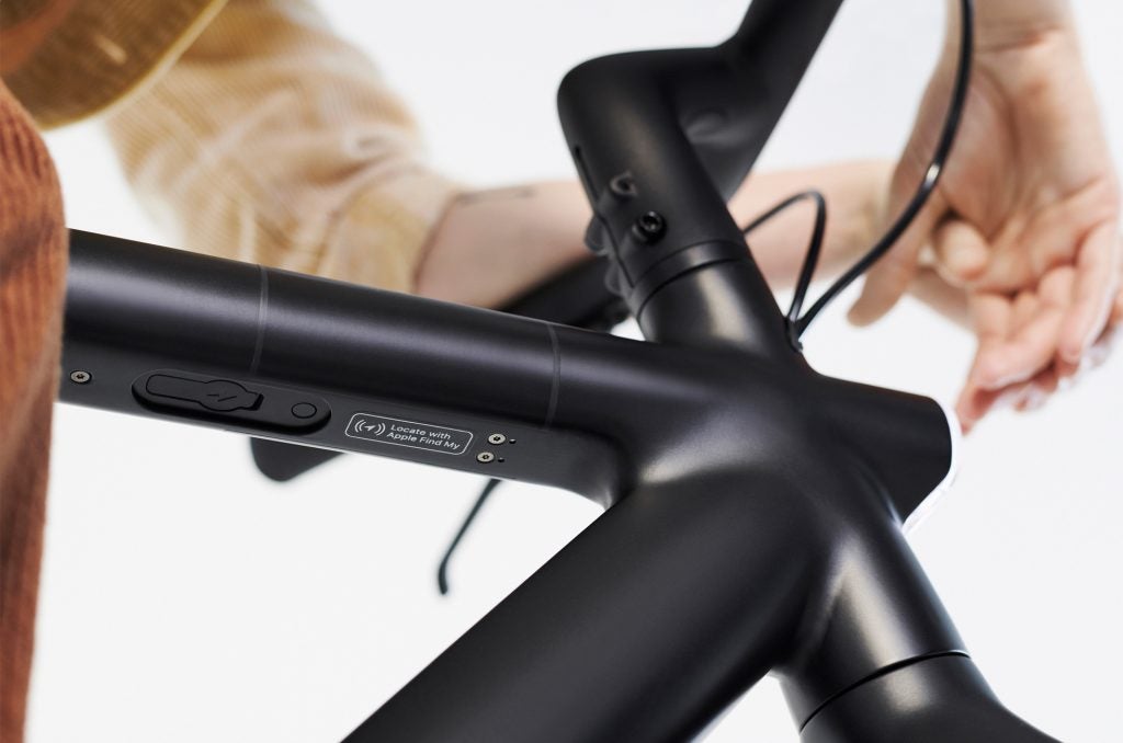 Close up image of a black cycle's handle with Locate with Apply Find My app written below 